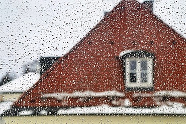 Window with raindrops, Germany, Europe