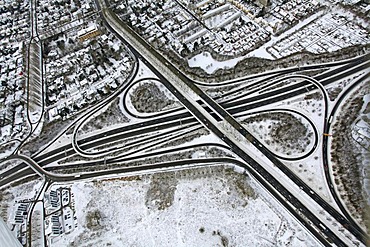 Aerial, A40, B236 highway, interchange, Stadtkrone-Ost industrial park in snow, Ruhrgebiet region, North Rhine-Westphalia, Germany, Europe