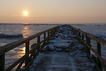 Pier over the icy mudflats of the North Sea, Husum, North Friesland, Schleswig-Holstein, northern Germany, Europe