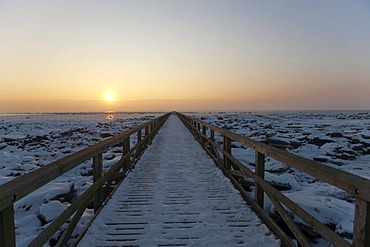 Pier over the icy mudflats of the North Sea, Husum, North Friesland, Schleswig-Holstein, northern Germany, Europe