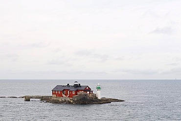 House and lighthouse on a skerry island off Gothenburg, Sweden, Scandinavia, Europe