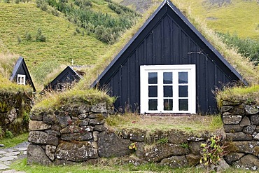 Historic houses with grass roofs in Skogar, Iceland, Europe