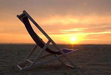 Deckchair and sunset on a beach of the Versilia, Lido di Camaiore, Riviera, Tuscany, Italy, Europe