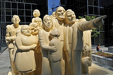 Illuminated Crowd Sculpture by Raymond Masson, in front of a skyscraper, downtown Montreal, Quebec, Canada, North America