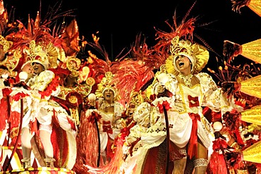 Samba dancers on an allegorical float of the Beija-Flor de Nikopol samba school at the Carnaval in Rio de Janeiro 2010, Brazil, South America