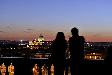 Pincio terrace overlooking St Peter's Basilica at dusk, Rome, Italy, Europe