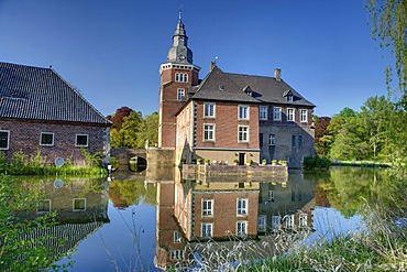 Haus Sandfort or Schloss Sandfort moated castle in Olfen-Vinum, Muensterland region, North Rhine-Westphalia, Germany, Europe