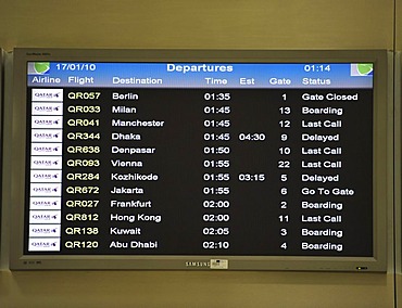 Departure board, Doha International Airport, Doha, Qatar, Asia