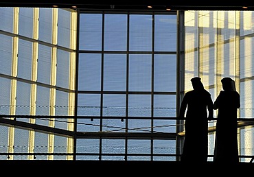 Qatari wearing traditional dress with gutra, inner shot of the atrium, Museum of Islamic Art, designed by I.M. PEI, Corniche, Doha, Qatar, Persian Gulf, Middle East, Asia