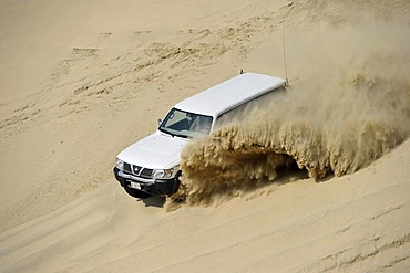 Ruptured tire of an off-roader 4500 Nissan Patrol 4500 Fuel Injection 4x4, driving in sand dunes, Emirate of Qatar, Persian Gulf, Middle East, Asia