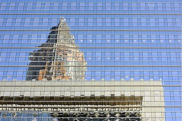 The top of the fair tower, Messeturm, and an office building reflected in the glass facade of an office skyscraper in the Frankfurt financial district, Bankenviertel, Frankfurt am Main, Hesse, Germany, Europe