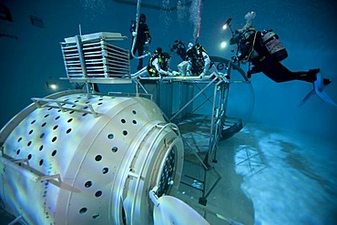 Backup divers and astronauts practicing with a space station module reproduction in a diving basin, European Space Agency, ESA, European Astronaut Center, EAC, Cologne, North Rhine-Westphalia, Germany, Europe