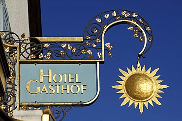 Inn sign for the "Hotel Gasthof Sonne" against the blue sky, Hauptstrasse 29, Ebermannstadt, Upper Franconia, Bavaria, Germany, Europe