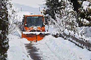 Winter road clearance, Unimog bulldozer, clearing snow, snow plough