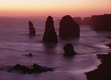 Rock stacks at coastline, dusk, Great Ocean Road, Victoria, Australia