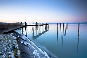 Jetty in the evening light on wintery Lake Constance near Triboltingen in Switzerland, Europe