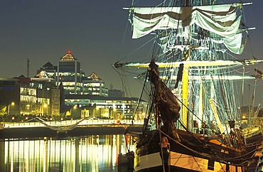 Janie Johnston sailboat and Sean O'Casey Bridge at night, River Liffey, bank building, skyline, Dublin, Ireland, Europe