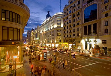 Pedestrians and road traffic in the Gran Via, Madrid, Spain, Europe