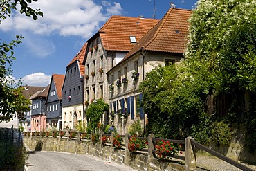 Slate-tiled sandstone buildings along the Oberen Markt in Thurnau, Franconian Switzerland, Franconia, Bavaria, Germany, Europe