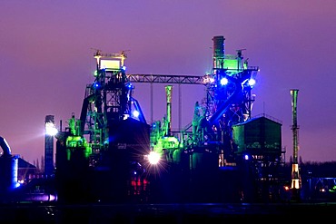 Colored lights illuminating the former smelting works in the Landschaftspark Duisburg Nord landscape park, Ruhrgebiet area, North Rhine-Westphalia, Germany, Europe