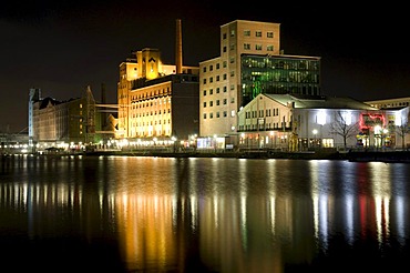 Hafenforum office building in the Innenhafen Duisburg inner harbor at night, Ruhrgebiet area, North Rhine-Westphalia, Germany, Europe