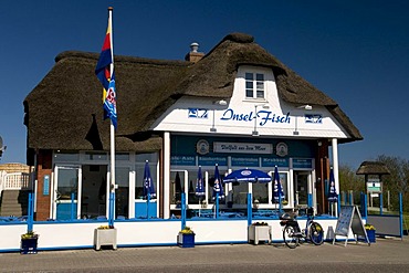 Thatched house, Insel-Fisch restaurant, Norderhafen harbor, Nordstrand island, Schleswig-Holstein, Germany, Europe