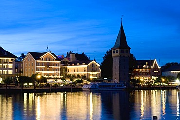 Illuminated buildings and Mangturm tower at the harbor, Lindau, Lake Constance, Bavaria, Germany, Europe