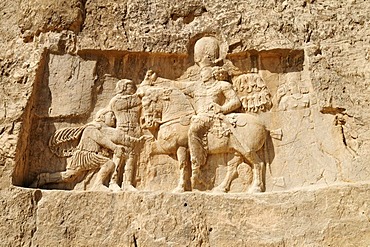 Sassanid relief of the triumph of King Shapur I. over the Roman Emperor Valerian and Philip the Arab at the Achaemenid burial site Naqsh-e Rostam, Rustam near the archeological site of Persepolis, UNESCO World Heritage Site, Persia, Iran, Asia