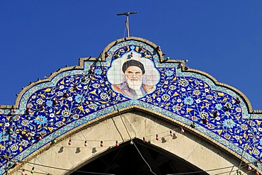 Portrait of Emam, Imam Khomeini at the bazar entrance of Shiraz, Fars, Iran, Asia