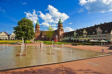 Playful fountains on Lower Market Square in front of the Parish Church, Freudenstadt, Black Forest, Baden-Wuerttemberg, Germany, Europe