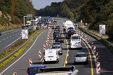 Traffic jam at the reduction of 3 to 2 lanes at a highway construction site on the A2 motorway, near Bielefeld, North Rhine-Westphalia, Germany, Europe