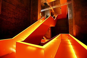 Red illuminated main staircase in the new Ruhrmuseum museum, opened in January 2010, Capital of Culture year, in the former coal washing plant of the Zeche Zollverein mine, World Heritage Site, Essen, North Rhine-Westphalia, Germany, Europe