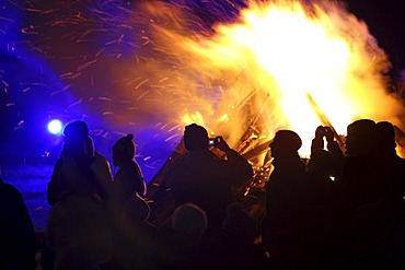 People in front of a huge bonfire, Essen, North Rhine-Westphalia, Germany, Europe