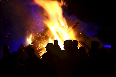 People in front of a huge bonfire, Essen, North Rhine-Westphalia, Germany, Europe