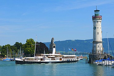 Harbor entrance with paddlewheel steamer Hohentwiel in Lindau, Lake Constance, Bavaria, Germany, Europe