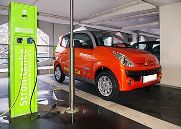 Charging station for electrical cars of a rental car company in a public garage in Dusseldorf, North Rhine-Westphalia, Germany, Europe