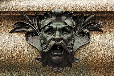 Face as a gargoyle on a fountain at the Marktplatz square, Erlangen, Middle Franconia, Bavaria, Germany, Europe