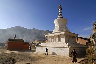 Two Tibetan women circling a stupa of the Labrang monastery, Xiahe, Gansu, China, Asia