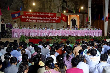 Event of the Communist Party in the Pathet Lao cave, Tham Sang Lot Elephant Cave, a long table with many delegates in front of a portrait of the former Prime Minister Kaysone Phomvihane, Vieng Xai, Houaphan province, Laos, Southeast Asia, Asia