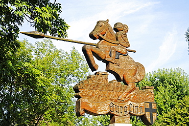 Sign with a knight on horseback holding a lance, Wasserburg Linn moated castle, Krefeld, North Rhine-Westphalia, Germany, Europe