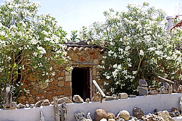 Rocks and minerals corner, the old school at back, Lychnostatis Open Air Museum, Museum of traditional Cretan life, Hersonissos, Crete, Greece, Europe