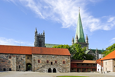 Palace of the archbishop in front of the tower of the Nidaros cathedral, Trondheim, Norway, Scandinavia, Europe