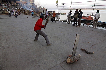 Cricket game in front of Burning Ghat cremation ground, Varanasi, India, South Asia