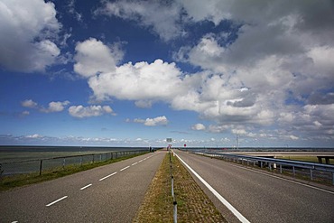 Highway road on the dyke between North Holland and Friesland, Afsluitdijk, Ijsselmeer, Netherlands, Europe