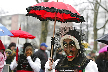 Original Kriens masks during a carnival procession in Littau, Lucerne, Switzerland, Europe