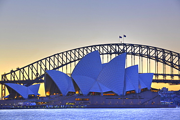 Sydney Opera House, Sydney Harbor Bridge at sunset, Sydney, New South Wales, Australia