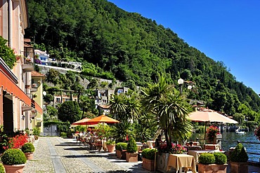 Promenade with restaurant terraces, Lake Maggiore, Cannero Riviera, Piedmont, Italy, Europe