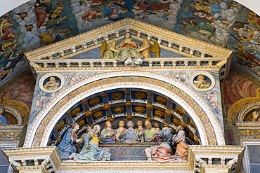 Sculptures over the entrance of Aosta Cathedral, La Cattedrale di Aosta, Piazza Giovanni XXIII, Aosta, Aosta Valley, Valle d'Aosta, Italy, Europe