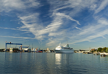 Inner fjord of Kiel with a cruise ship and the HDW shipyard, state capital of Kiel, Schleswig-Holstein, Germany, Europe