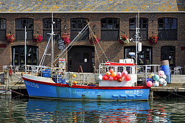 Fishing boat in the old port of Weymouth, Dorset, England, UK, Europe